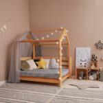 Ein stilvoll eingerichtetes Kinderzimmer mit Bodenbett